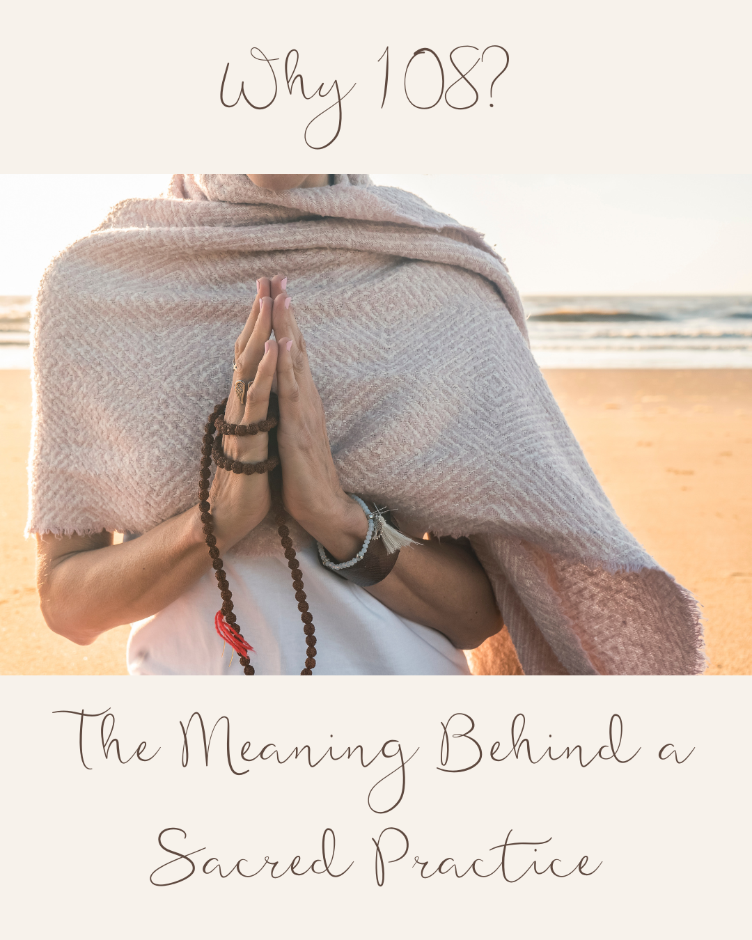 A woman on a beach in prayer hands holding a rudraksha mala, wrapped in a soft shawl at sunrise